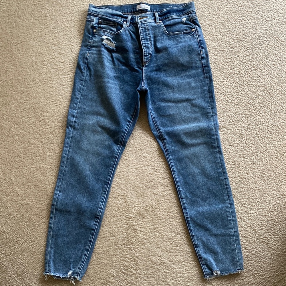 Loft skinny jeans in medium wash. Size 12. Frayed at the ankles.
